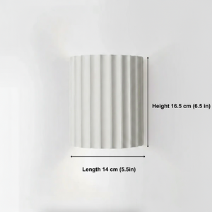 Striped cylindrical object with measurements on a white background