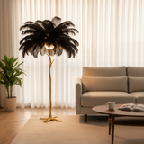 Modern living room with a feathered floor lamp, sofa, and coffee table.