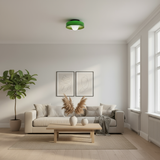 Modern living room with a beige sofa, wooden coffee table, and decorative elements.