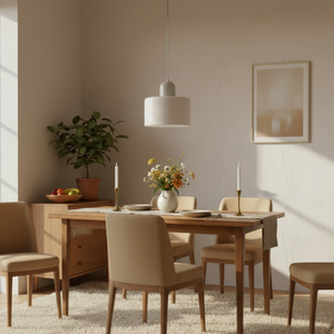 Dining room with wooden table, chairs, and decor elements.