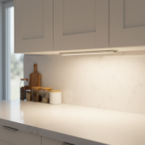 Modern kitchen with light gray cabinets and white countertop