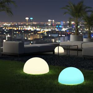Outdoor patio with glowing spherical lights and city skyline view