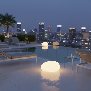 Evening scene at a rooftop pool with city skyline in the background