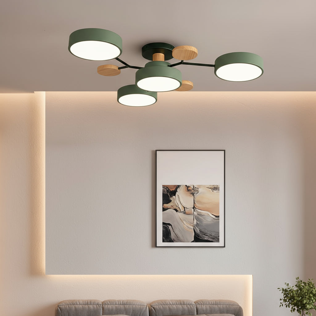 Modern ceiling light fixture in a living room with a painting on the wall.