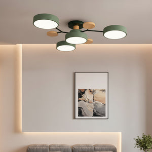 Modern ceiling light fixture in a living room with a painting on the wall.