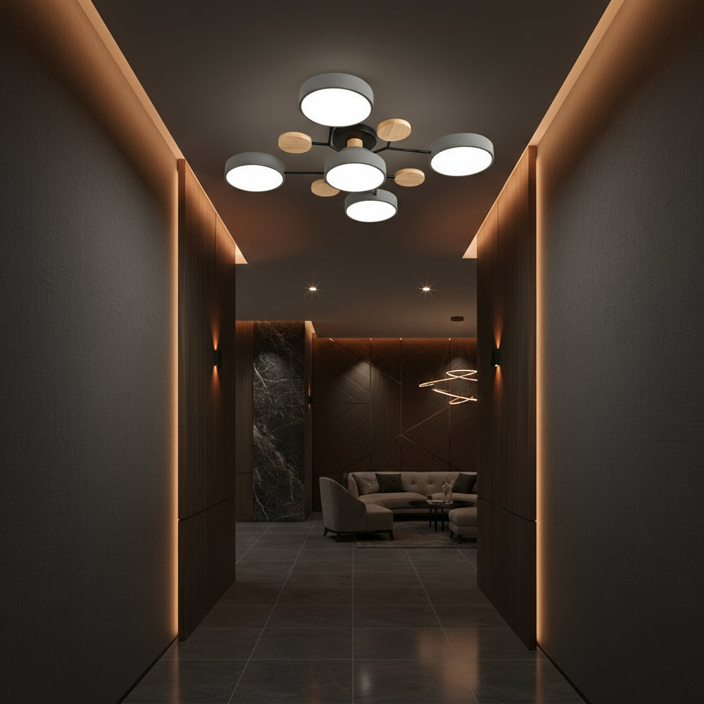Modern hallway with stylish lighting fixtures and a sofa.