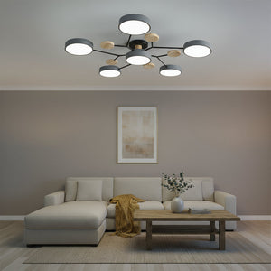 Modern living room with a chandelier, sofa, and coffee table.