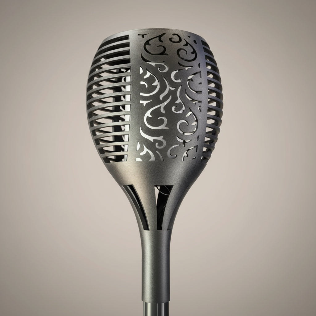 Decorative metal spoon with intricate cut-out design on a beige background